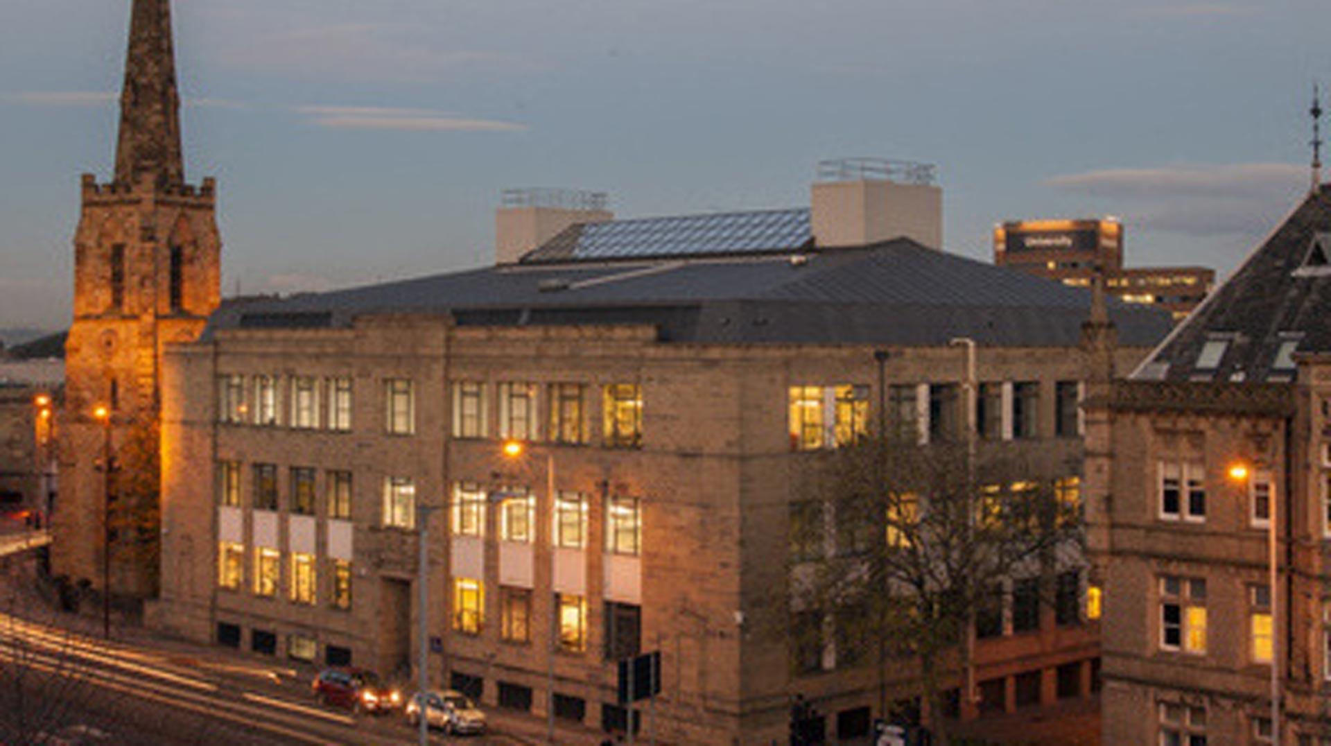 A picture of the Joseph Priestly building in the evening