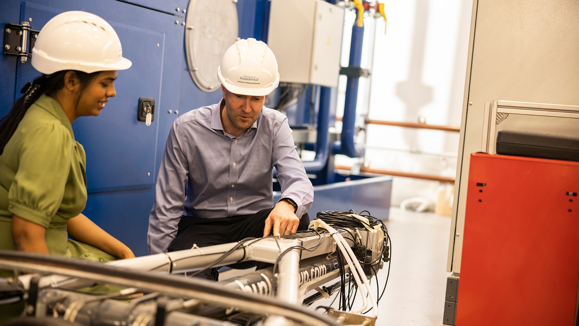 Student and academic in Engineering lab