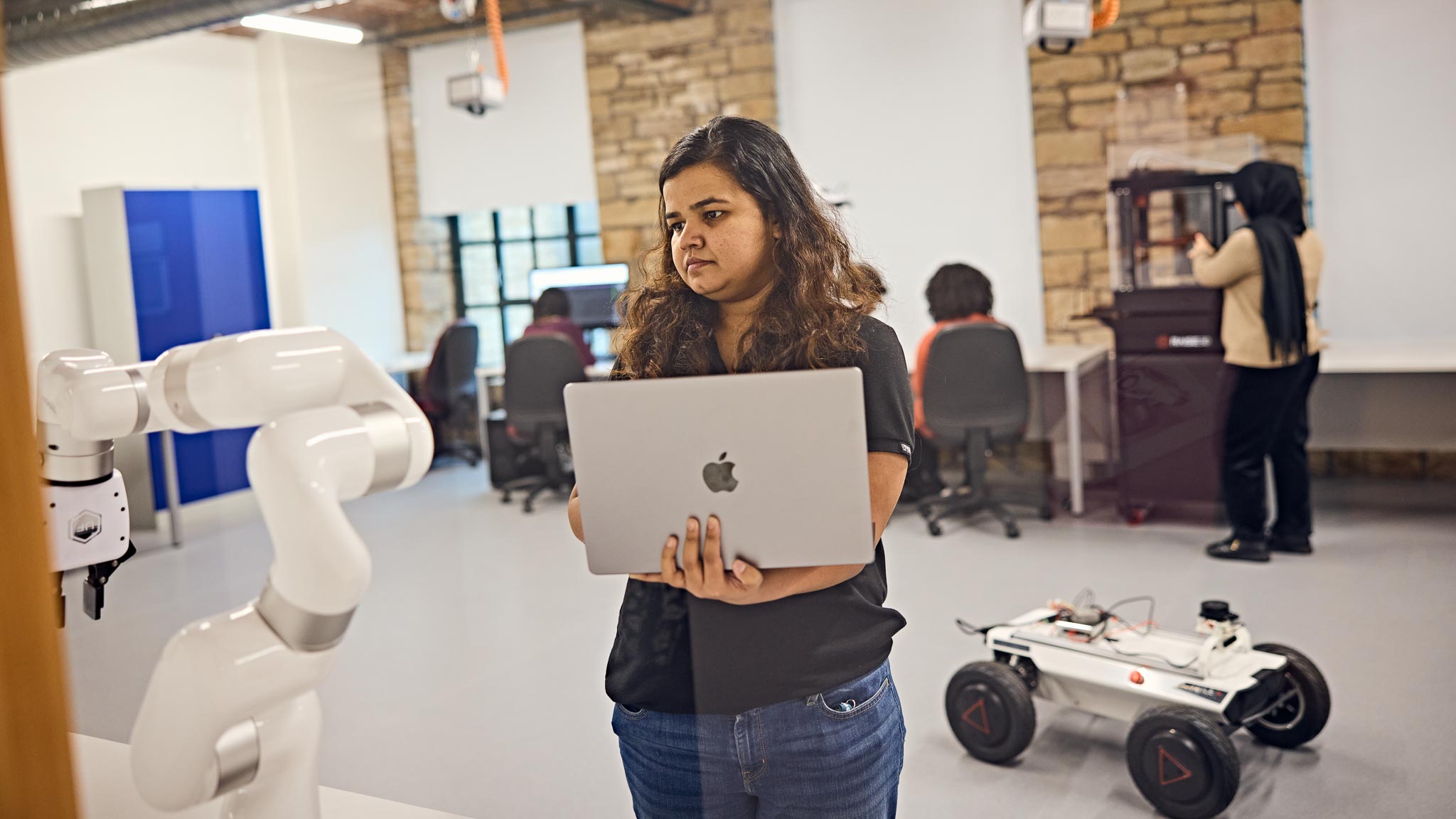 Students working in a Robotics lab