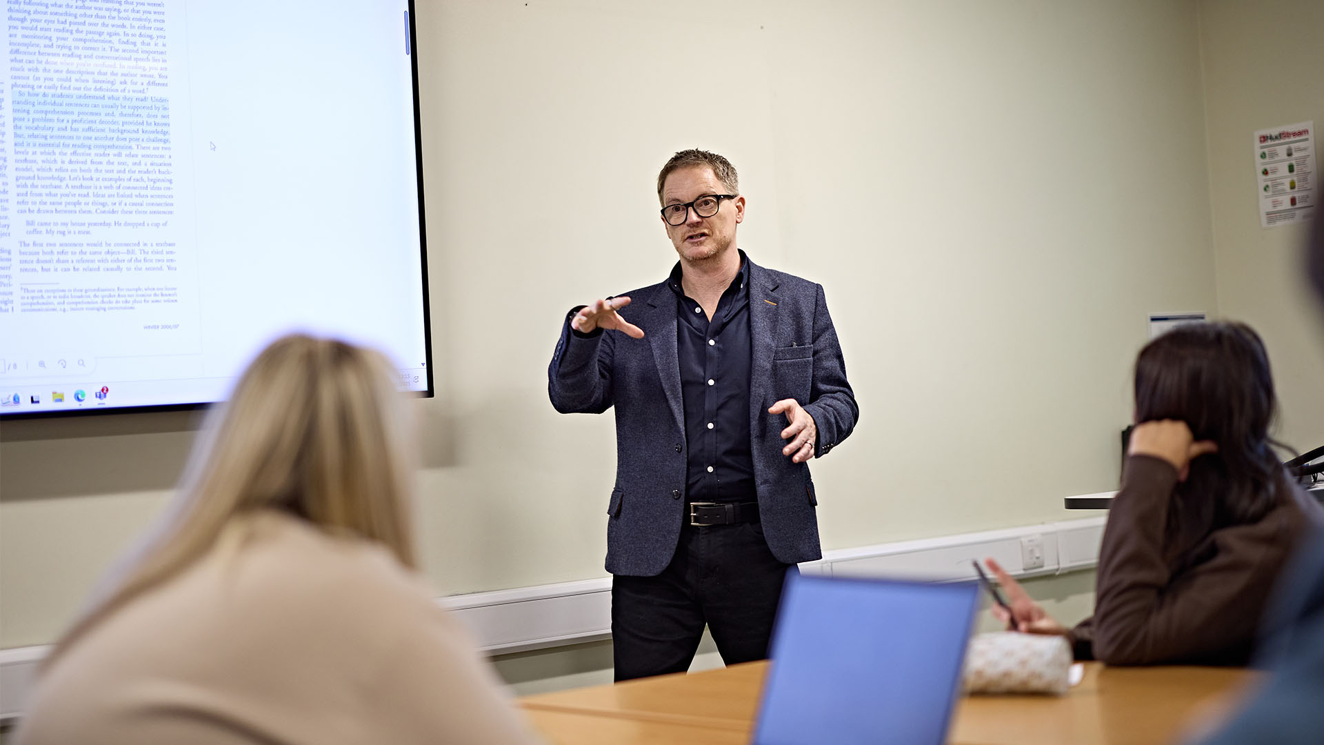 Teacher speaking to the class