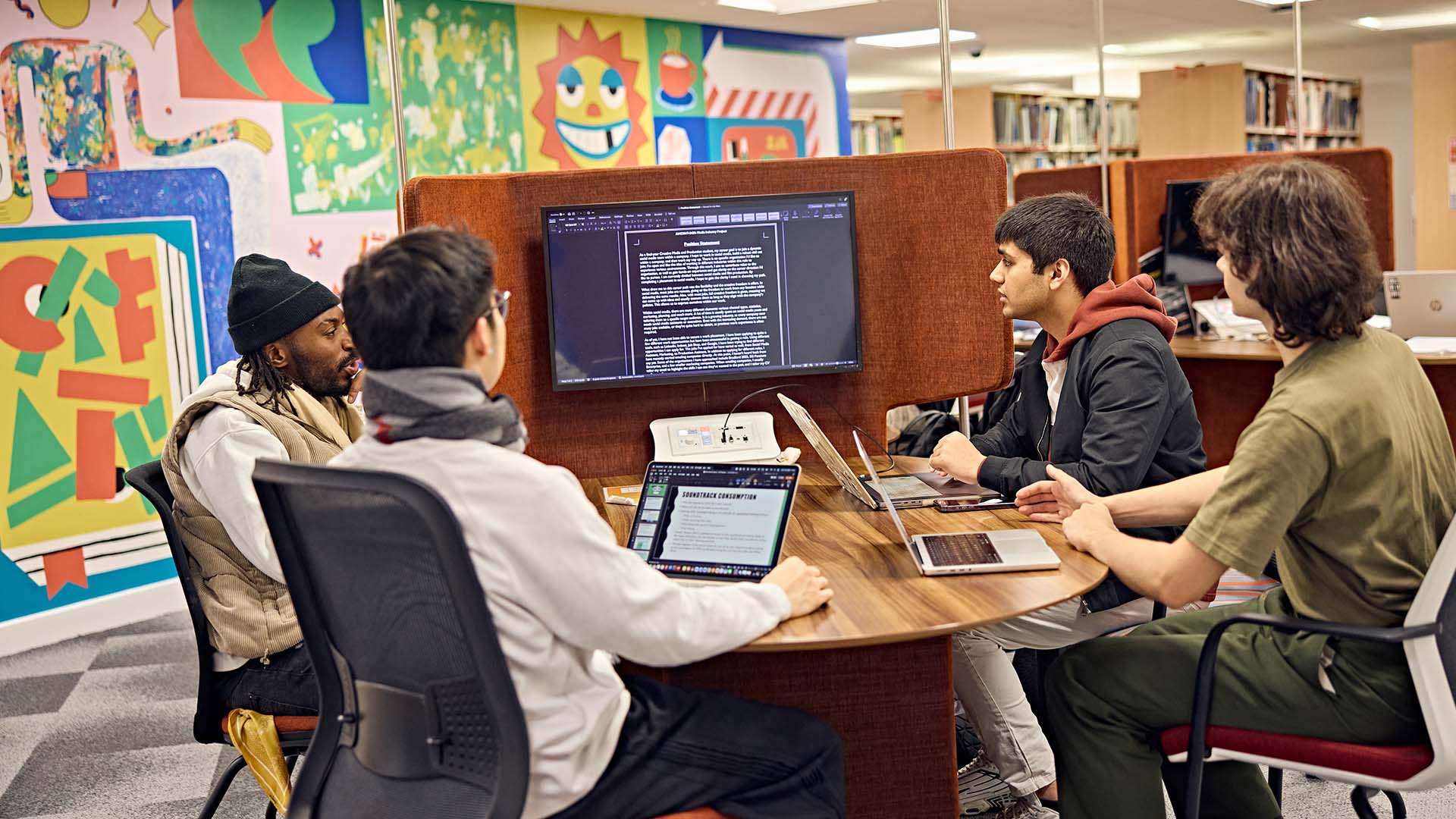 Three history students in library