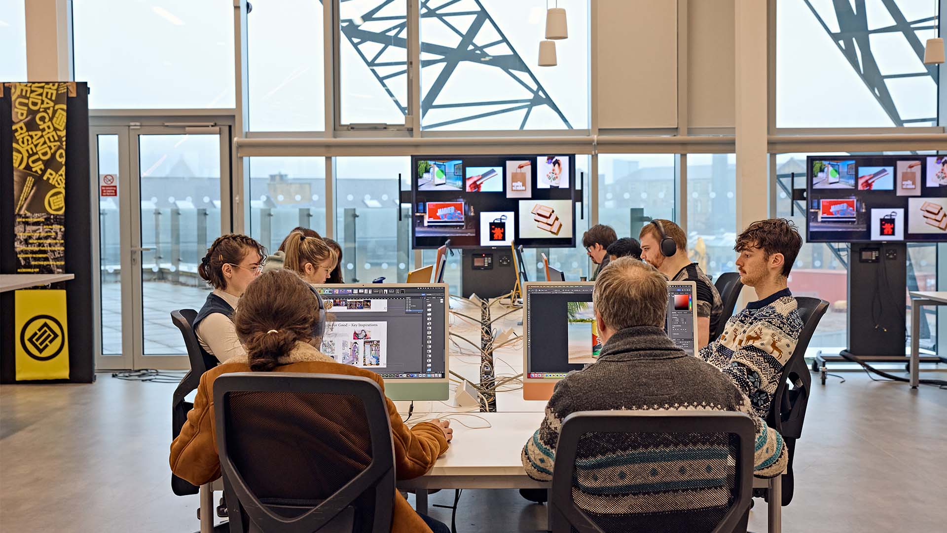 Students working in graphic design studio