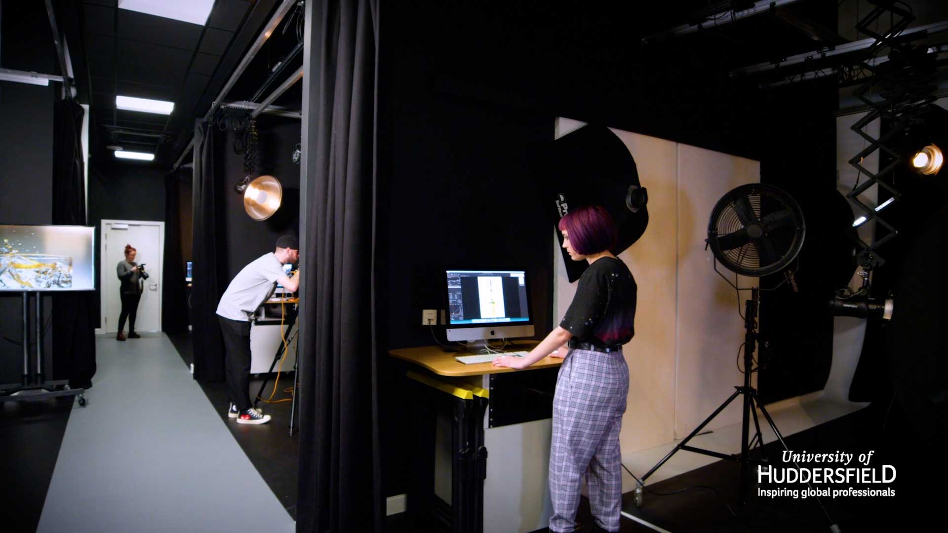 Students using the photography studio bays in the Barbara Hepworth Building