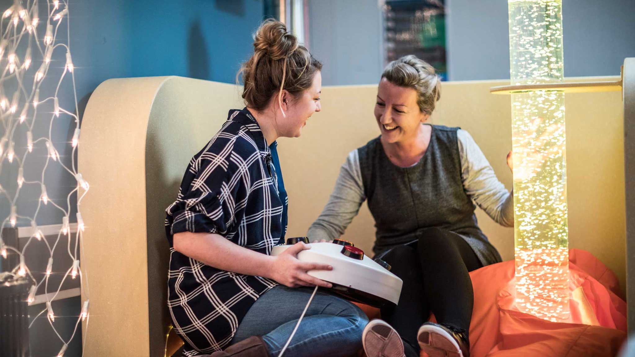 Students using multi sensory equipment