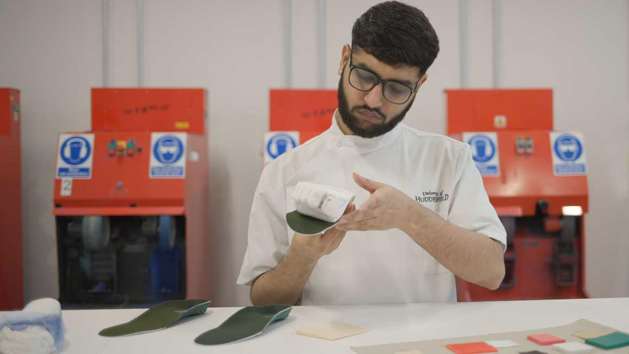 A student using manufacturing orthopaedic devices